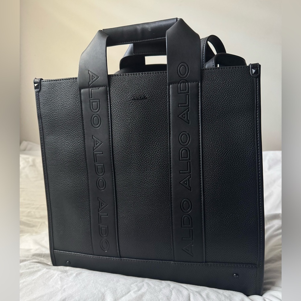 New black Aldo purse, handle and strap, footed, internal side pockets. Good zip.
